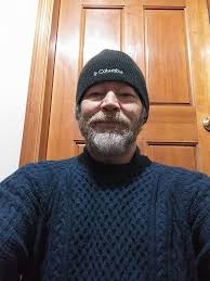 Wearing a newly purchased sweater from last winter