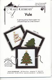 Perforated paper is used for counted cross stitch. Yule Counted Cross Stitch Pattern