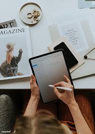 Download Premium Psd Of Fashion Designer Using A Digital Tablet Mockup At In 2020 Digital Tablet Ipad Image Tablet