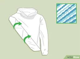 Leave the shirt in the bleach for about 10 minutes, until you start to see a color change.e spray or squeeze bottle method: How To Tie Dye A Hoodie 12 Steps With Pictures Wikihow