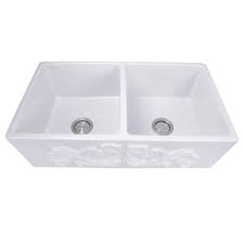 Farmhouse sinks were first created back when there was no running water and people used to store water in a jar in front of their sink. Nantucket Sinks Fcfs3318d Filigree 33 In Double Bowl Farmhouse Fireclay Sink With Filigree Apron