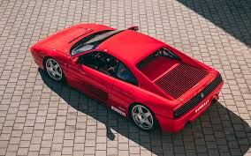 As on the outgoing ts, the hard top was stowed away in the space behind the seats. 1994 Ferrari 348 Gt Michelotto Competizione Gearmoose