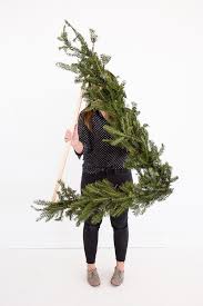 Whether you like using large wreaths outdoors or simple garland on your mantel. How To Make A Giant Holiday Wreath 3 Ft Tall And Shaped Like A Triangle
