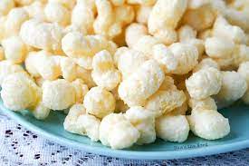 Instructions · spread the puffcorn in a single layer on a lined cookie sheet(s). White Chocolate Puffcorn Num S The Word