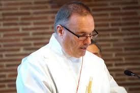 Men move forward toward their diaconate ordination