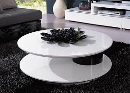 The construction of the coffee table is sleek and durable. Round Shaped Contemporary White And Black Coffee Table Round Coffee Table Modern Coffee Table White Coffee Table Furniture