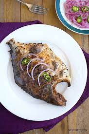 Spicy Grilled Fish Baked Whole Fish Grilled Fish Recipes Fish Recipes