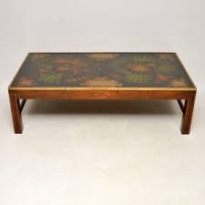 Large coffee tables work well with bigger sofas such as corner sofas, whereas small coffee tables work better in more compact rooms and seating arrangements. Very Large Antique Brass Mahogany Atlas Coffee Table Marylebone Antiques