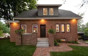 Brick holiday house incorporates 2 cultures. A Benson Brick House Sat As An Unfinished Shell For Nearly 80 Years Until Now Inspired Living Omaha Com