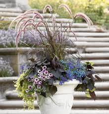 Seasonal container gardens will keep your porches, decks and entryways looking pretty all year round. How To Build Stunning Fall Container Gardens Topeka Landscape