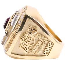 The lakers' kobe bryant reacts during the unveiling of the 2010 championship banner. History Lakers Championship Rings Los Angeles Lakers