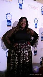 Her eyes are a light brown color, and her hair is a dark brown color, as well. Loni Love Birthday Age And Zodiac