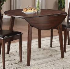 Dakota Round Drop Leaf Table With The Growing Popularity Of Mango Wood The Brick Wanted To Add A Beautif Drop Leaf Table Drop Leaf Dining Table Dining Table