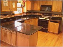 granite countertops with oak cabis