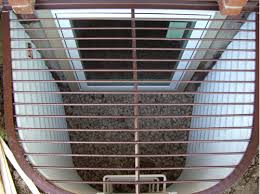 Basement window well steel grate covers. Window Well Covers Custom Window Well Covers Metal Mesh Or Lexan