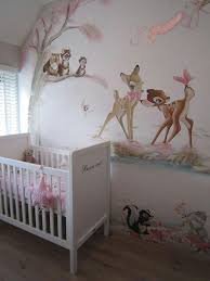 A Pink Bambi Wall Mural Is Charming In This Girl S Nursery Unique Nursery Ideas Children S Ro Baby Girl Room Themes Disney Baby Rooms Baby Boy Room Nursery