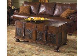 Ashley furniture is still best known for their wood furniture pieces, so we'd recommend something like the timberline media chest, the trinell queen bed, the birnalla desk, the donnie two drawer nightstand, or the norlandon square end. Mckenna Coffee Table With Storage Ashley Furniture Homestore