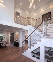 Contemporary Staircase With Modern Interior Railing High Ceiling Crown Molding Metal Staircase Hardwood Fl Interior Railings Modern Stairs Modern Staircase