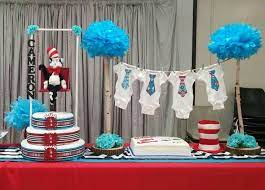 Dr Seuss Diaper Cake Cat In The Hat Baby Shower Theme Onesie Clothes Line Created By Cyd Hal Dr Seuss Baby Shower Seuss Baby Shower Trendy Baby Shower Ideas
