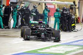 A black flag penalty imposed in which the driver must stop in the team's pit stall and can go. Why Bottas Changed Three Tyres At His Last Stop In Bahrain