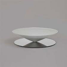 A massive metal cone appears to be floating above a mirror polished steel base. Original Design Coffee Table Float La Chance Steel Aluminum Stainless Steel