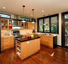 In terms of design, it is quite different, as it makes use of a bold color, and expertly the frosted glass cabinets with their stainless steel trimming and a distinctive design, exuding class and sophistication. Best Modern Kitchen Door Design Ideas With Glass 2020