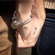 Couple Heart Tattoo On Hand Tattoo Designs Ideas Red ink heart and lock key couple tattoo. couple heart tattoo on hand tattoo