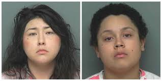 Bank teller and her girlfriend arrested in connection with Woodlands robbery