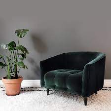 the carla chair is crafted using luxurious italian velvet made from 100 cotton creating a truly co living room green green velvet armchair living room decor