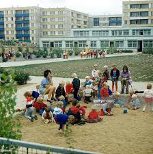 Kindergaertnerin Mit Spielenden Kindern In Einem Sandkasten In Einer East Germany East Berlin Childhood Memories