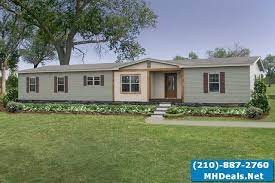 Full drywall, 8' ceilings, 2x6 ext walls with upgraded 28/19/11 insulation package, huge den with electric fireplace. Double Wides
