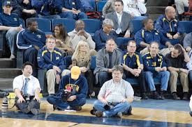 File:Rich Rodriguez, Wife & Football Coaches.jpg