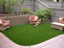 7 Ways To Make Your Backyard A Doggie Paradise Fake Grass Backyard No Grass Backyard Backyard Landscaping