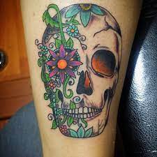 Dia de los muertos foot tattoo design. Sugar Skull Tattoos Sugar Skull Tattoos Skull Tattoo Design Sunflower Tattoo Shoulder