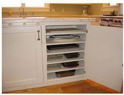 Tips For Organizing Pots And Pans Pocket Change Gourmet Kitchen Cabinetry Kitchen Storage Kitchen Organization