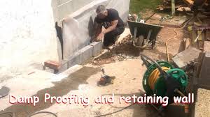 Check spelling or type a new query. Building A Retaining Wall For The Driveway And Damp Proofing B Roll Video Youtube