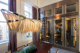 If you are a wine enthusiast, you definitely leave a spot in your kitchen for sturdy, ergonomic, and classy wine glass racks to give your precious wine glasses a safe and neat storage. Joseph Curtis Custom Wine Cellars