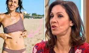 Julia Bradbury: Countryfile star showcases scar in bikini after big hernia  operation