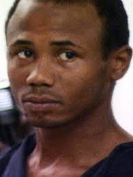 Fellow inmates curse suspect in killing of nun