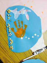 Handprint Fish Bowl Summer Art Project Ocean Theme Craft Under The Sea Could Use Multiple Color Summer Art Projects Sea Crafts Preschool Ocean Theme Crafts
