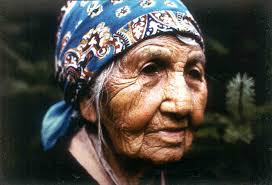 Tuckwalt (aka Mrs. Louisa Wyaleta), in front of her home near Nehalem,  Oregon