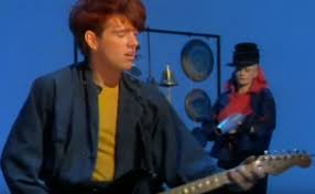 Written by the band members, the song was produced by alex sadkin and the group's lead vocalist tom bailey. Thompson Twins Hold Me Now Official Music Video The 80s Ruled