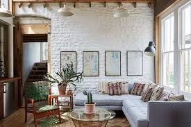 This gorgeous little space is centered around a fireplace and manages to incorporate two small sofas facing each other and two comfortable armchairs. Modern Country Interior Design Defined Get The Look Decor Aid