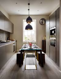 Benches with dining tables are also suitable for casual dining restaurants for a more communal dining experience. Table In Middle Of The Kitchen Ideas Photos Houzz
