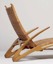 Hans J Wegner The Dolphin Chair C 1950 Material Oak Cane And Brass Produced By Johannes Hansen Denmark Phillips Iconic Chairs Wegner Chair