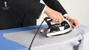 Folding portable mini collar iron electric clothes iron for travel business trip. Iron Vs Steamer Which Is Best For Your Menswear Wardrobe