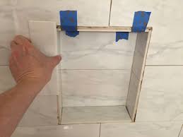 For height, you have fewer limitations. Can I Glue A Decorative Tile To The Existing Tile For A Shower Niche Home Improvement Stack Exchange