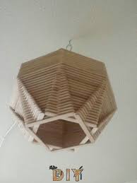 Popsicle Stick Globe Light Popsicle Pinterest Popsicle Stick Crafts Craft Stick Crafts And Popsicle Sticks Diy Popsicle Stick Crafts Wood Stick Decor Craft Stick Crafts