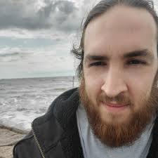 Why is white smoke coming out of my bike's air filter when I try to start?