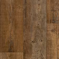 We installed luxury vinyl plank flooring over the concrete in the basement (some new concrete and some old). Mohawk Vinyl Sheet Hampton Heights Ivc Umber Vinyl Sheet Flooring The Home Improvement Outlet